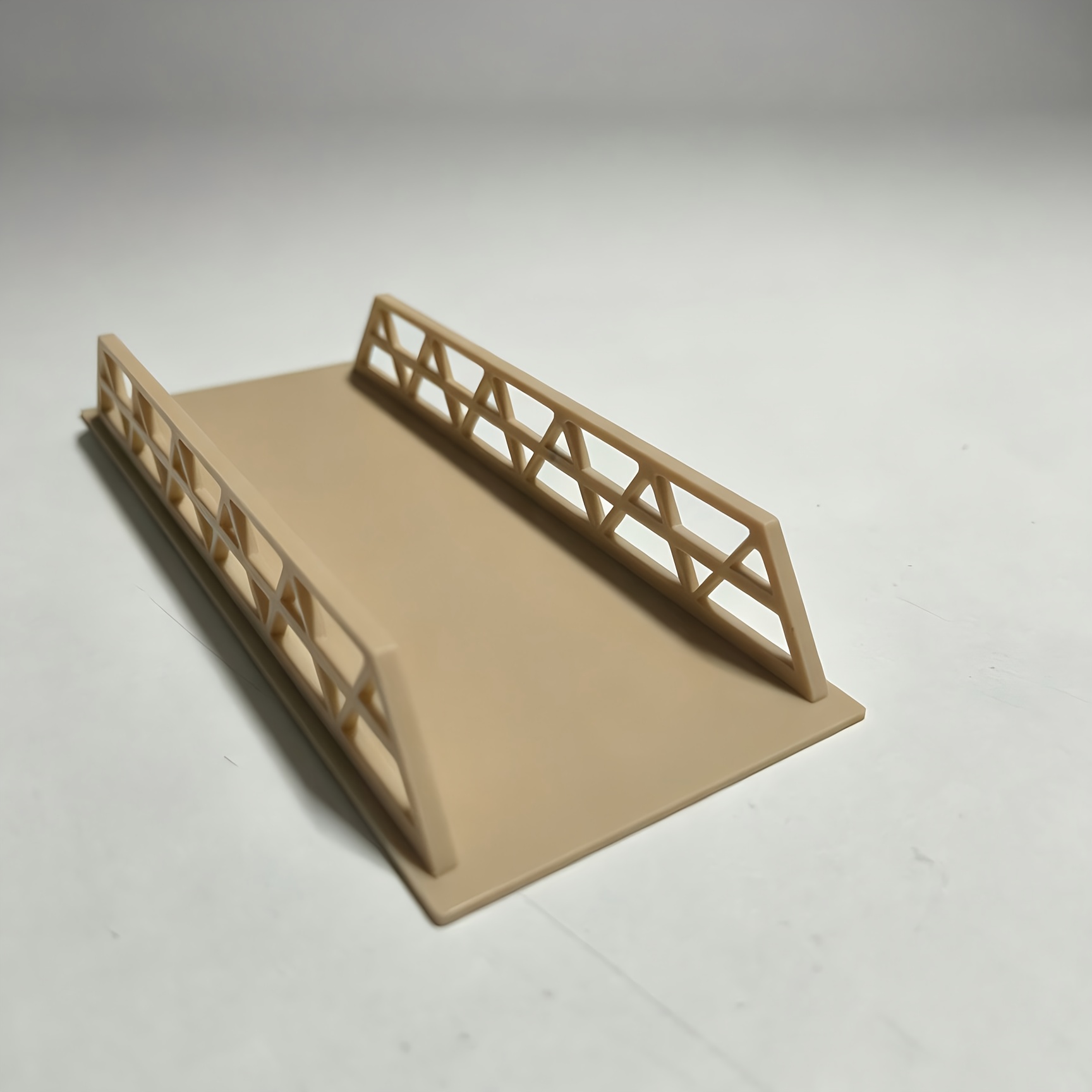 Yellow Miniature Bridge Model Replicating Real Bridge Structure